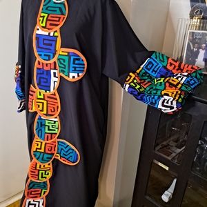 Stretchy gorgeous short dress. Designed with gorgeous Ankara prints